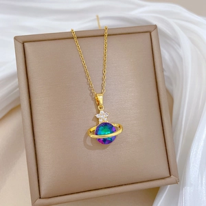 Elegant gold titanium galaxy necklace with purple star planet pendant and crystals