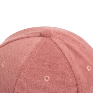 Pink sherpa baseball cap made of thick thermal fleece with embroidered eyelets