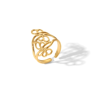 Detailed view of adjustable golden hollow line ring with abstract floral curve design