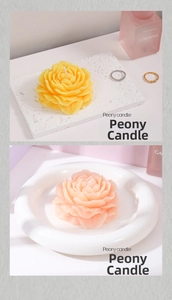 Detailed close-up of pink and yellow peony flower candles with layered petal textures
