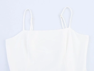 Detail of white square neck camisole dress with adjustable straps and bodice stitching