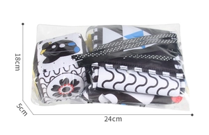 Detailed dimensions of the black and white high-contrast baby cloth book in packaging