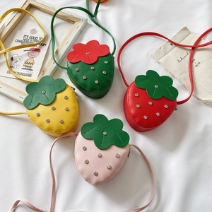 Sparkly strawberry-shaped kids crossbody bags in four vibrant colors with rivet details