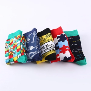 Detailed knit texture of mid-calf socks with geometric formulas and colorful patterns