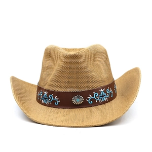 Vintage straw cowboy hat with embroidered floral band and turquoise metal buckle