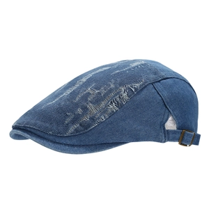 Distressed denim ivy cap in vintage blue with ripped details and adjustable buckle