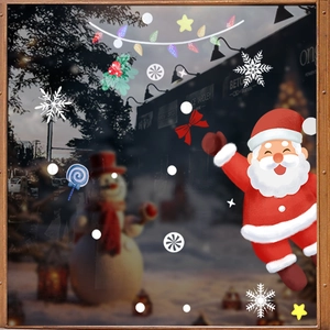 Festive Christmas window stickers featuring Santa, snowman and snowflakes on glass