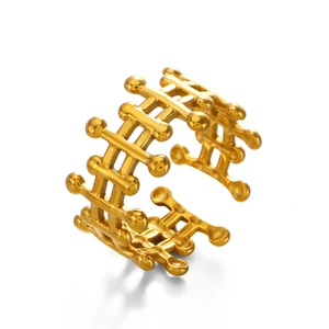 Golden stainless steel open ring with a geometric hollow grid pattern design