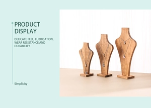 Three-tier wooden necklace display stands in light wood finish for jewelry window displays