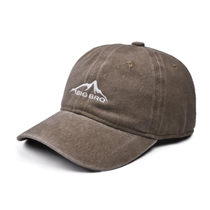 Close-up of BIG BRO mountain embroidery on dark brown washed cotton baseball cap