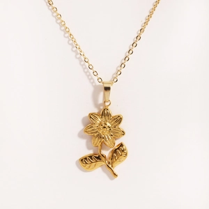 Elegant 18K gold plated sunflower pendant necklace featuring detailed petals and stem