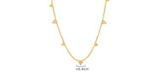 Detail of 18K gold-plated titanium necklace with small triangular CZ stone pendants
