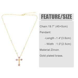 Close-up of gold plated brass cross necklace with four purple cubic zirconia stones