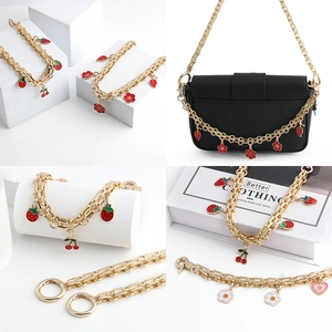 Golden chain strap for handbags with strawberry, cherry, and flower enamel charms