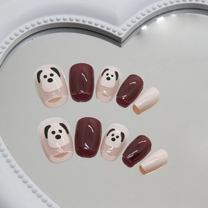 Cute puppy press-on nails in burgundy and cream white with short trapezoid shape
