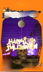 Detail of Happy Halloween LED suction cup window light showing AA battery box power supply