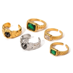Vintage 18k gold plated emerald ring set with colorful zircon stones on white background