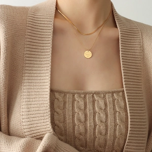Elegant 18k gold-plated stainless steel double-layered necklace with engraved round pendant