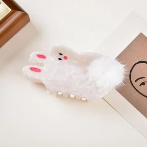 Cute white bunny hair claw clip with pink ears and soft pom-pom tail for women