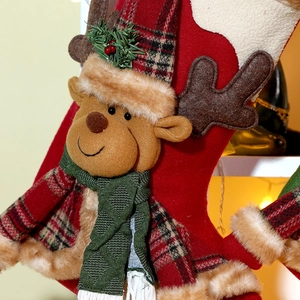 Christmas stocking decoration with plush 3D reindeer design and festive red green plaid trim
