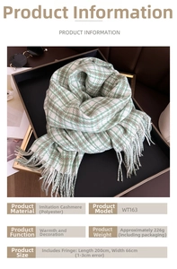 Detail of green and white plaid scarf showing soft cashmere-like fabric and tassels