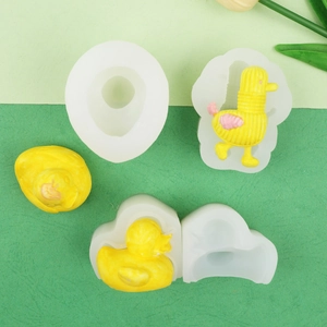 Detailed silicone mold showing 3D little duck shapes and colorful DIY resin finished samples