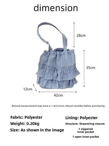 Detailed blue gingham tote bag specifications with ruffle trim and interior pocket