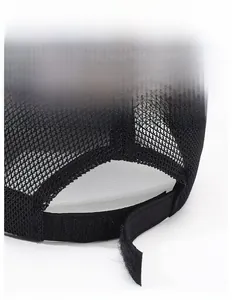 Detail of adjustable hook and loop fastener on black breathable mesh baseball cap