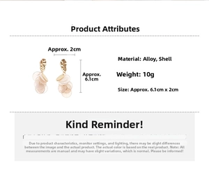 Detail view of gold alloy earrings with white shell pendants, size 6.1cm by 2cm