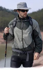 Detail of waterproof sun hat with adjustable wind cord for outdoor hiking and fishing