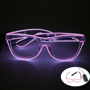 Macro detail of transparent LED glowing glasses with pink EL wire for parties and music festivals