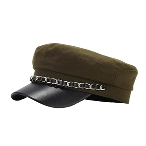 Olive green newsboy cap with black leather visor and decorative silver chain strap