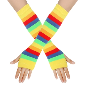 Detail of colorful rainbow striped knitted arm warmers with fingerless thumb hole design