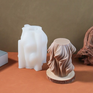 Detailed view of flexible silicone candle mold with swirl textured resin masterpiece