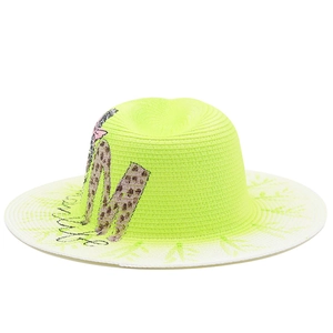 Neon yellow straw sun hat with large leopard print letter M and floral brim details
