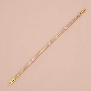 Detail of pink zircon water drop bracelet with gold plating and rectangular crystals