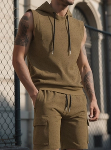 Men's olive sleeveless hoodie set with textured fabric and drawstring cargo shorts details