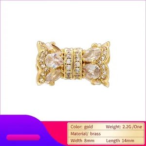Bowknot spacer bead in gold plated brass with cubic zirconia for DIY jewelry making