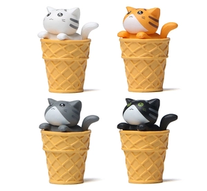 Detailed view of four colorful cat figurines nestled in miniature ice cream cones