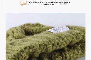 Detail of green cable knit scarf showing thick windproof yarn texture and warm weave