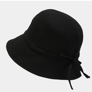 Elegant black bucket sun hat for women featuring a stylish bow and breathable fabric