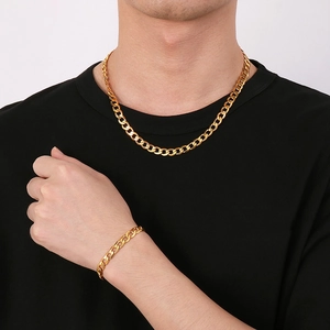 Men's hip hop gold Cuban link chain set with necklace and bracelet on model
