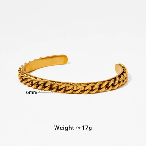 Detail shot of 6mm wide gold Cuban link open bangle with 17g weight specifications