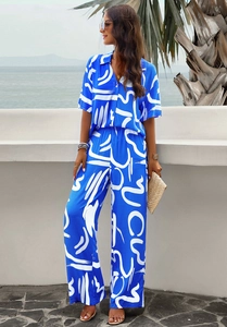 Blue and white abstract print two-piece summer set with short sleeve shirt and wide-leg pants