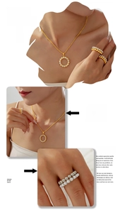 Detail showing layered pearl necklace and gold rings displayed on model skin