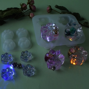 DIY silicone mold set for resin cat paws with built-in LED light base and craft tools