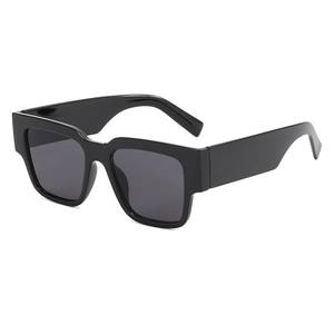 Classic black rectangular sunglasses with oversized frames and thick temples in side view
