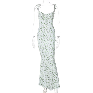 Detail of white floral sundress showing tie-up chest design and mermaid hemline