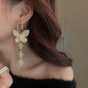 Elegant gold butterfly earrings with faux pearls and long diamond flower tassel fringe