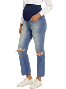 Detail of light blue maternity jeans with belly band and ripped knee design